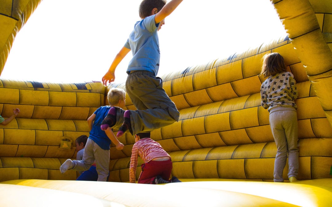 Children on bouncy castle