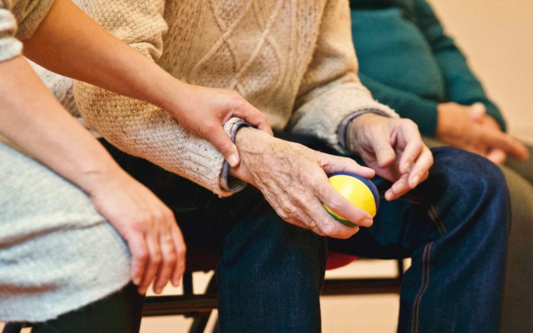 Elderly man with ball