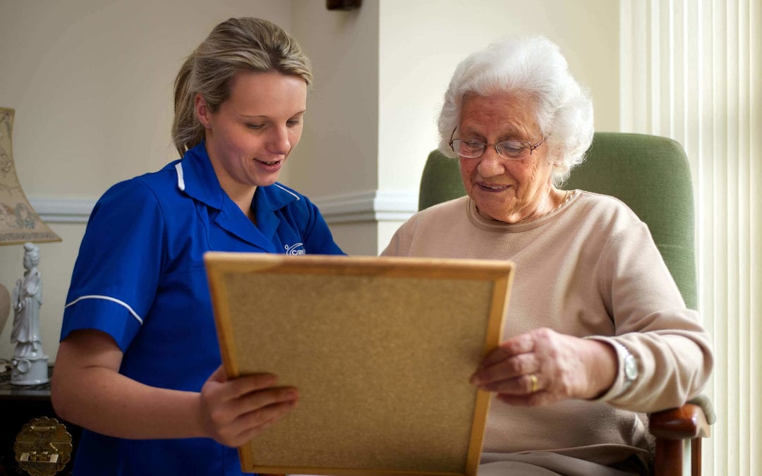 Support Worker and Elderly Woman