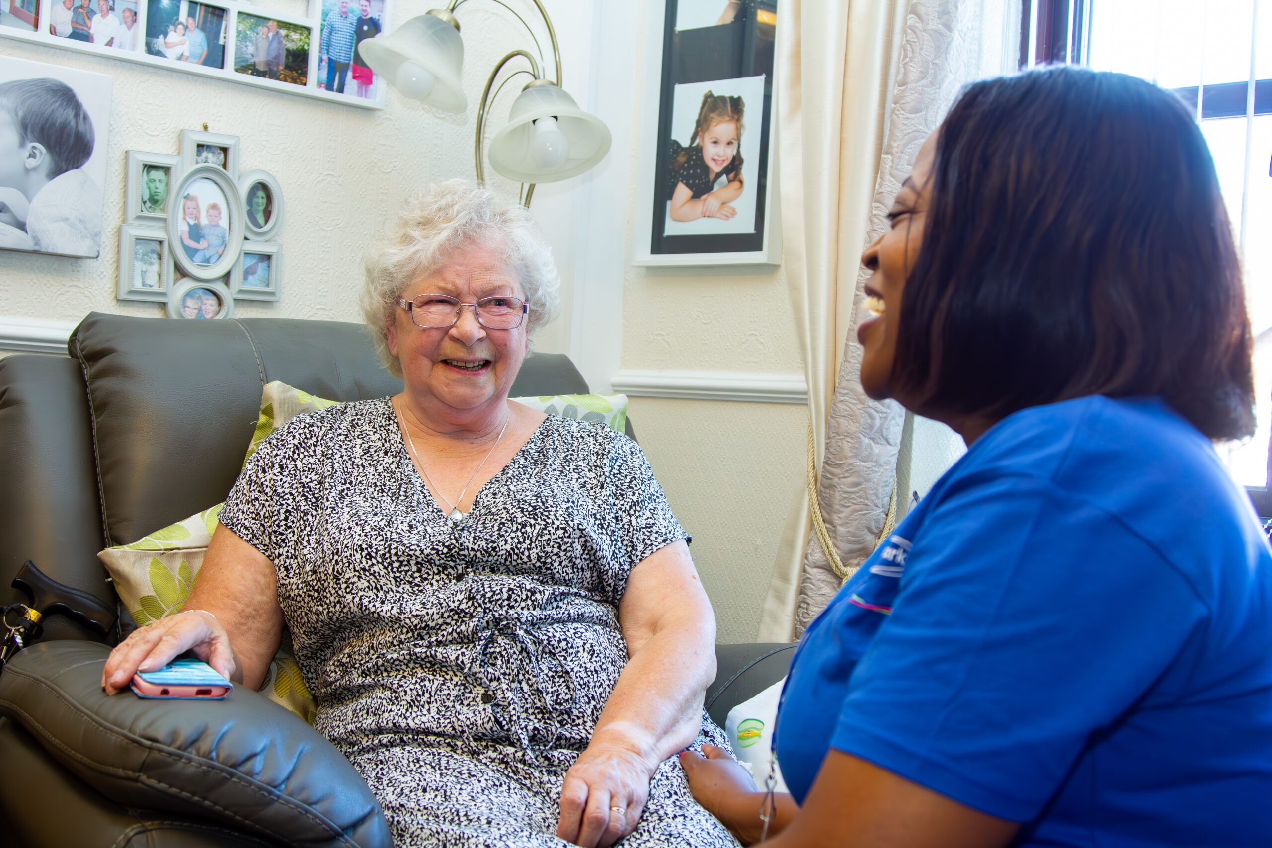 smiling customer with female care assistant